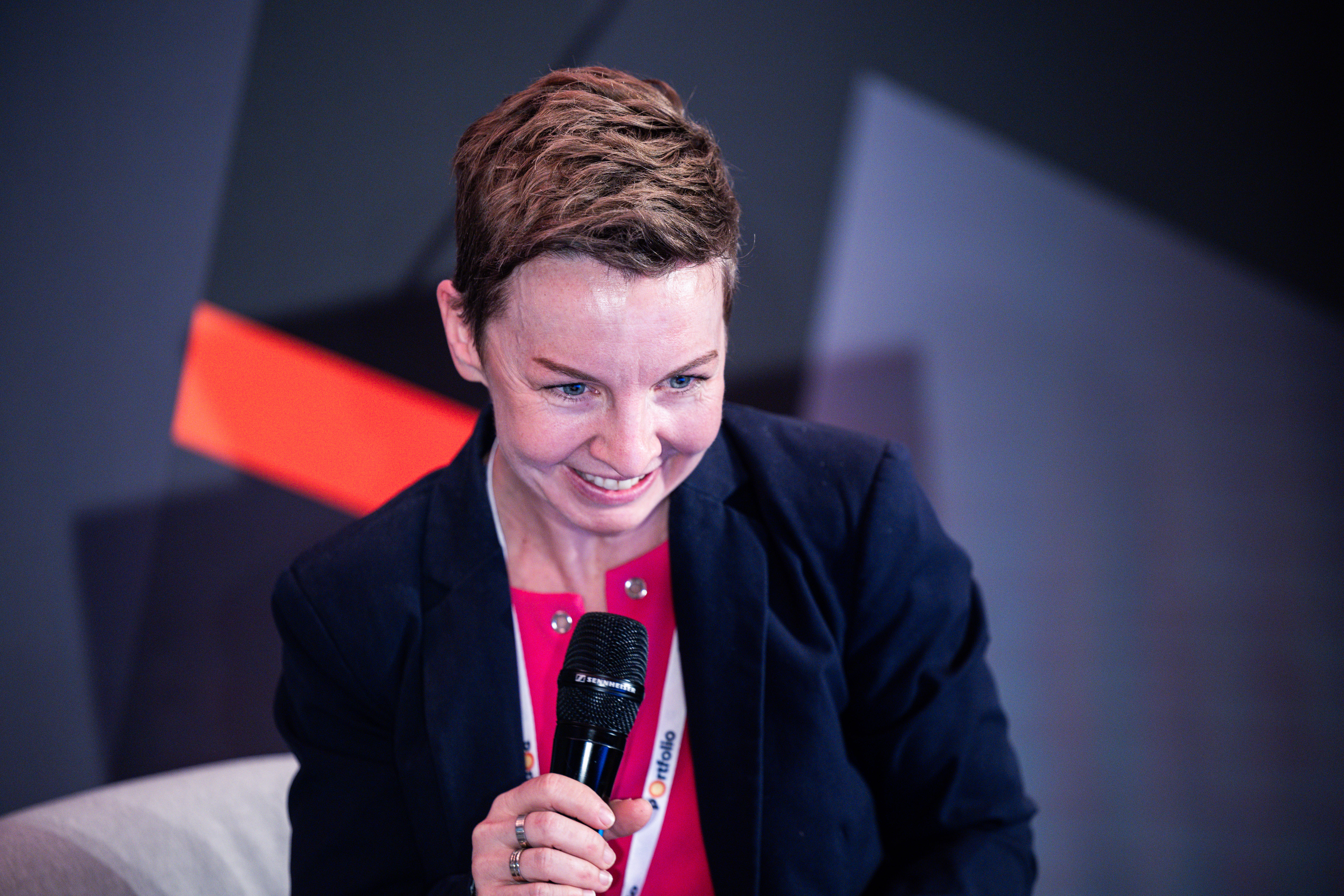 Dorka Nagy-Józsa smiling with microphone